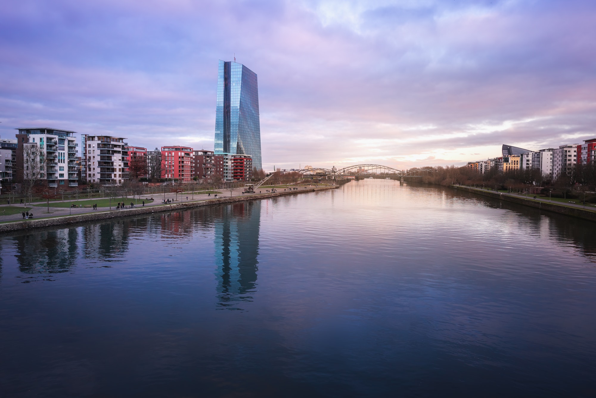 Main River skyline at sunset with ECB Tower (European Central Bank) - Frankfurt, Germany